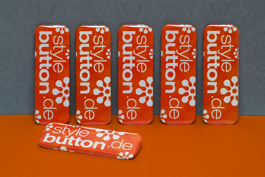 6 Stück bedruckte Buttons: rechteckig 70 x 25 mm