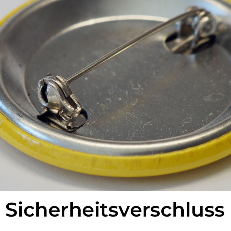 Der Sicherheitsverschluss des 37-mm Buttons ist mit einem drehbaren Riegel gesichert.